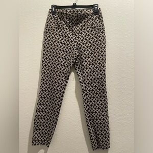 Ankle cropped Joe B fitted pants with rich pattern/design.